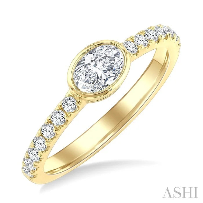 Oval Shape East-West Bezel Set Diamond Ring